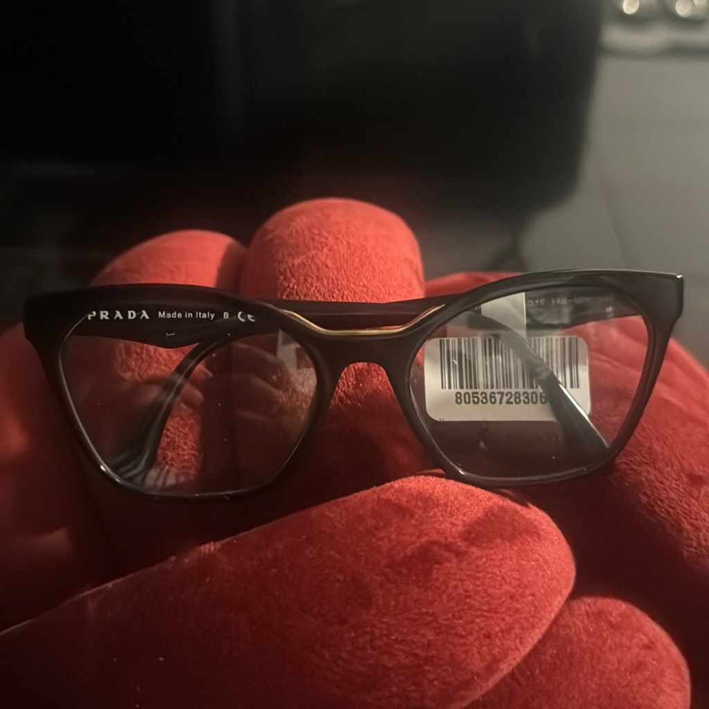 Prada Blk Frame With Gold Trim.